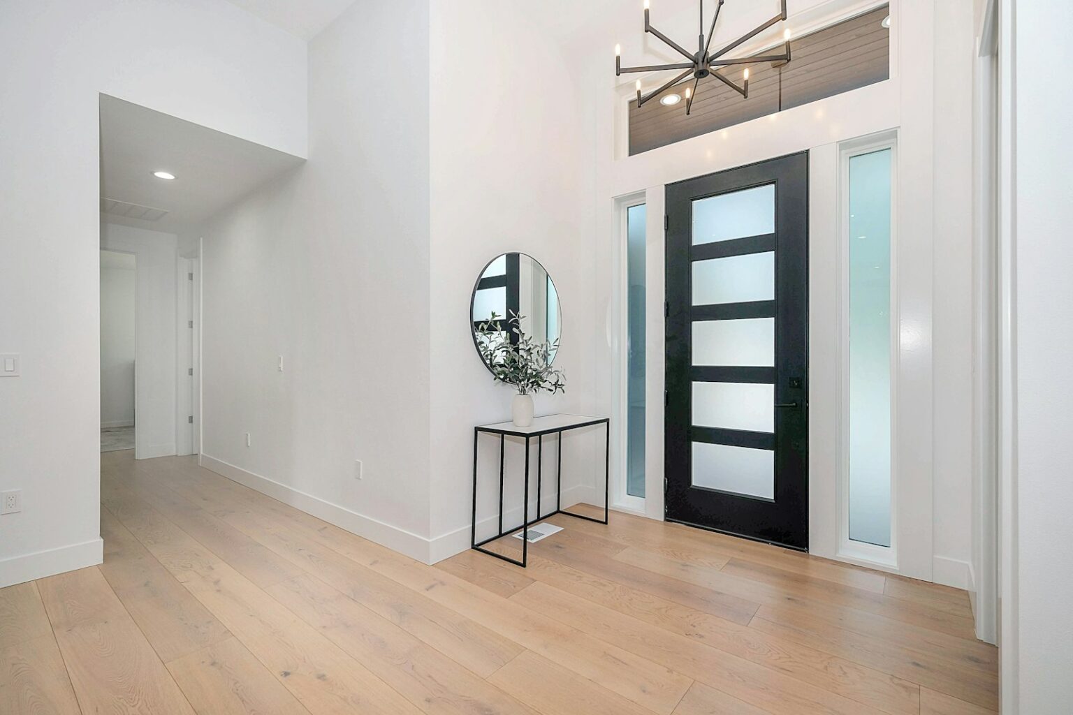 Ring Camera: The Next Era of Home Security Bright modern home entryway with a glass front door